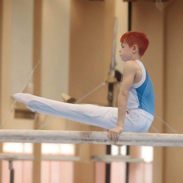 boy-is-practicing-bar-with-red-hair